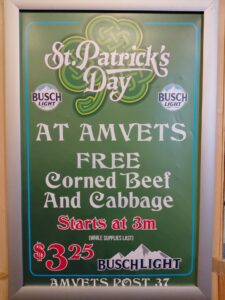 poster with information on the free st patrick's day corned beef & cabbage meal at Central City AMVETS Post 37 starting at 3 pm until gone