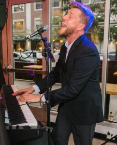 photo of chris powell singing