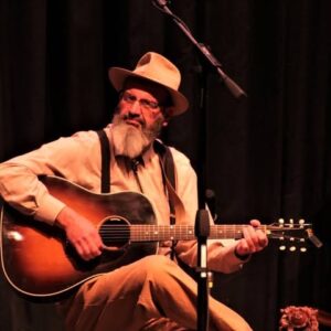 image of Frankie Joe Wilderman holding a guitar