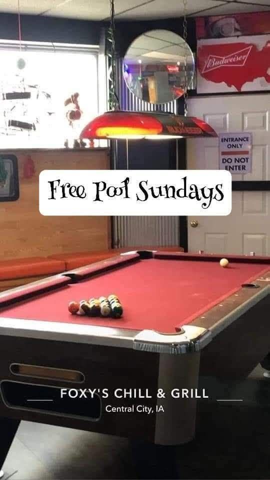 image of a pool table advertising free pool on Sundays of Foxy's Chill & Grill